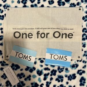 TOMS dust bag with stickers
